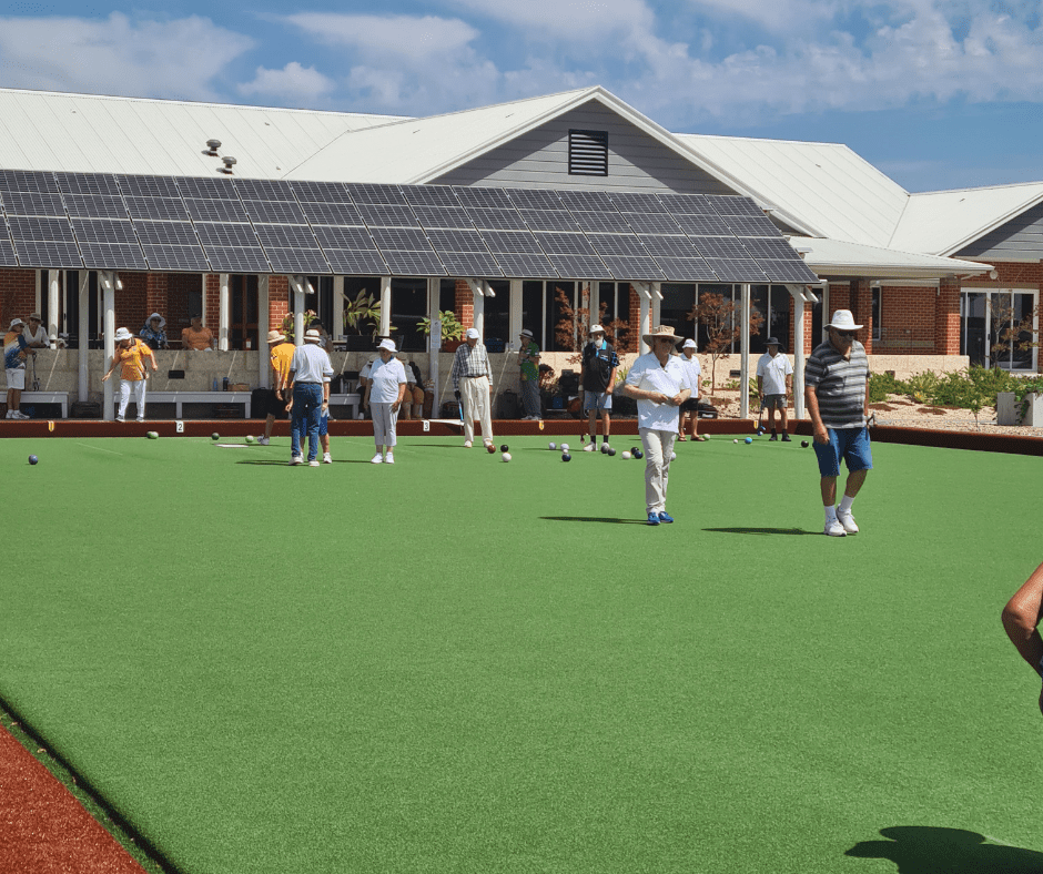 Teams enjoying the tournament on the Edenlife Australind community bowling green.